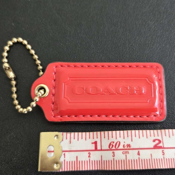 Coach Patent Leather Purse Charm Hang Tag Keychain Burnt Orange - Picture 1 of 3